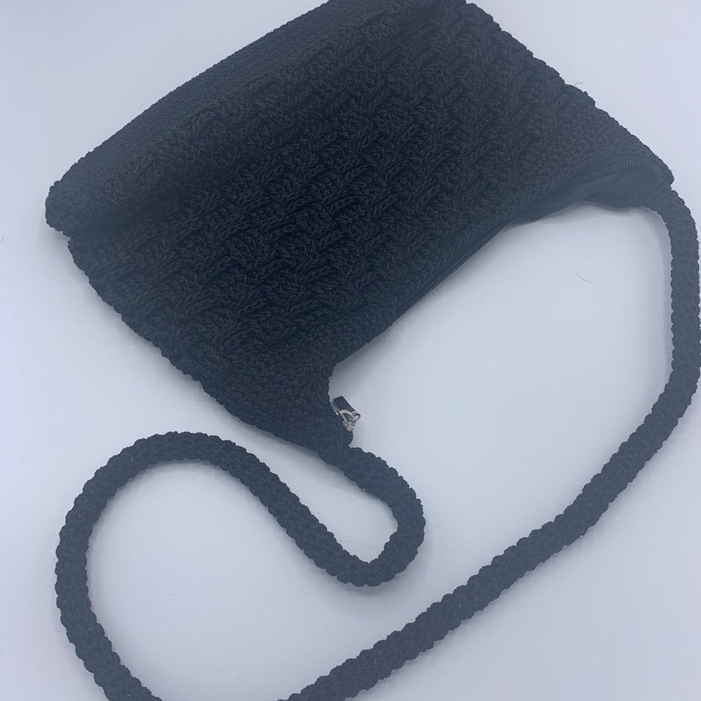 Black woven zip closure purse